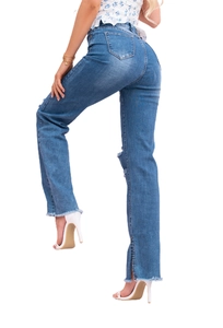 Women's flared stretch denim jeans in washed blue with knee rips and side slit frayed hems