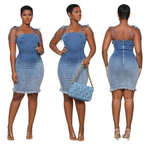 Washed blue denim bodycon midi dress with backless halter straps and frayed hem