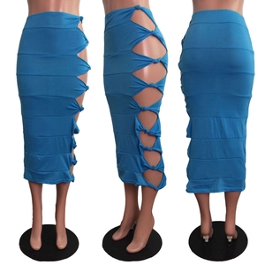 Detail view of blue high-waist knit skirt with sexy side cut-outs and knot ties