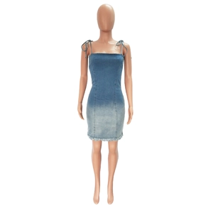 Detail of gradient blue denim midi dress with frayed hem and slim fit backless style
