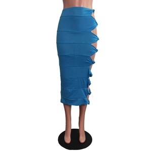 Detail of teal high-waisted midi skirt featuring side cut-out and knotted tie design