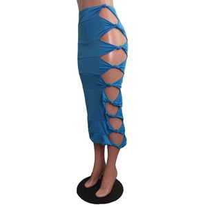 Detail view of blue high waist midi skirt featuring side cut-outs and knot decorations