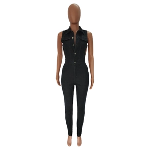 Detail of slim-fit black denim bodysuit featuring side cut-outs and metal buttons