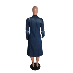 Detailed back view of dark blue long sleeve denim coat dress with distressed ripped details