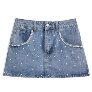 Slim fit light blue denim mini skirt with elegant pearl embellishments and high waist