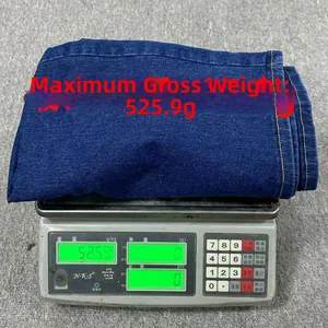 Detailed view showing the actual weight of 525.9g for these high waist denim shorts