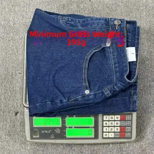 Detailed weight measurement showing a pair of high waist denim shorts in size S weighing 395g