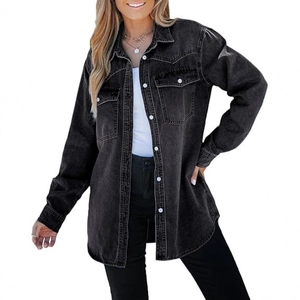 Detail of grey washed denim jacket with white buttons and large double chest pockets