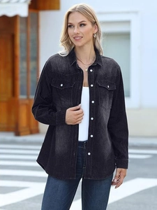 Classic wash grey denim shirt jacket with chest pockets and white buttons in street style
