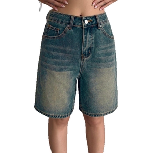 Women's vintage wash high-waisted denim shorts in a loose fit and knee-length cut