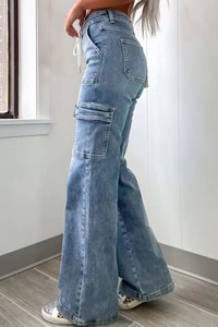 Side view of light blue straight cargo jeans with functional side flap pockets