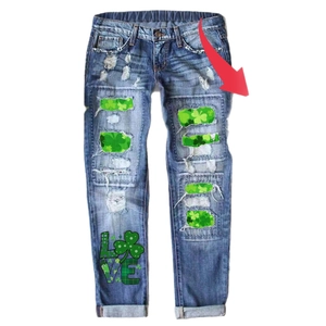 Women's St. Patrick's Day ripped blue jeans with green clover patches and LOVE print