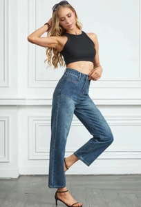Women's black halter crop top and high-waisted wide-leg jeans with utility pockets
