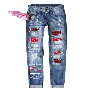 Women's ripped Christmas jeans with wine-themed print and festive red plaid patches