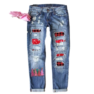 Women's 3D Christmas tree patch jeans with distressed denim and red festive patterns
