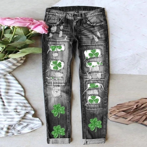 Deep grey St. Patrick's clover print jeans with sequin clover motifs and distressed holes