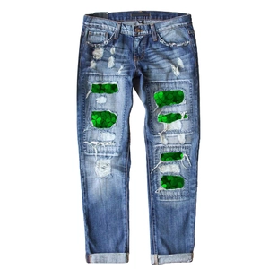 Women's St. Patrick's Day straight jeans with distressed clover print and ripped details