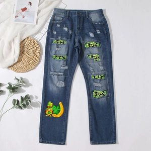Straight dark blue washed jeans with clover patches and festive holiday digital printing