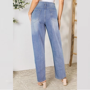 Women's light blue high-waisted wide-leg jeans shown from behind with washed denim texture