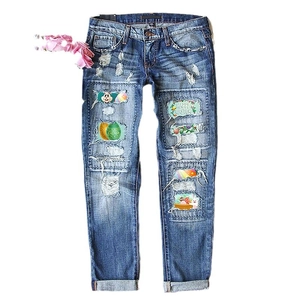Women's mid-rise straight distressed jeans with Easter bunny prints and ripped denim details
