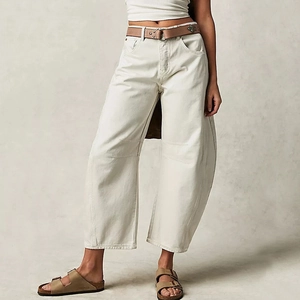 High waist cream wide leg denim pants with brown rivet belt and silhouette cut