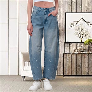 Light blue high waisted wide leg denim pants with vintage paint splatter and pleats