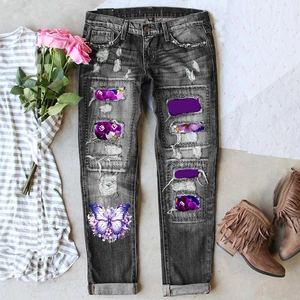 Women's dark gray ripped straight jeans with purple floral patches and butterfly print