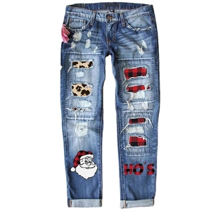 Women's blue ripped jeans with Christmas plaid patches, leopard print and Santa patterns