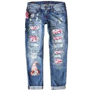 Women mid-waist straight jeans with distressed ripped holes and Cupid heart gnome prints