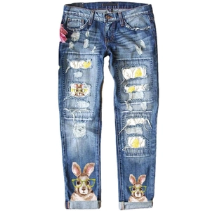 Slim fit washed denim jeans for women with cartoon rabbit prints and distressed holes