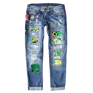 Women's St. Patrick's Day ripped jeans with clover print and distressed denim details