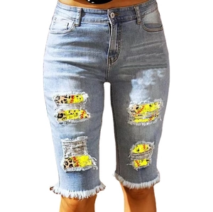 Women high waisted light blue denim shorts with leopard and baseball print distressed patches