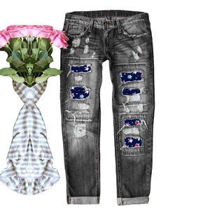 Distressed straight-leg jeans with vintage grey wash and patriotic star pattern patches