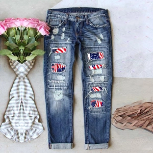 Jean slim bleu pour femme avec déchirures et empiècements drapeau américain