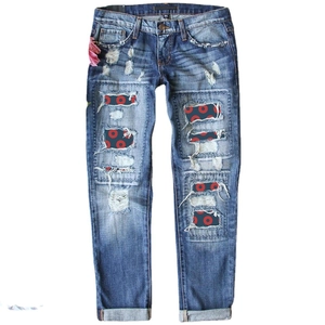 Mid-rise blue ripped straight jeans with red dot patches and pink flower detail