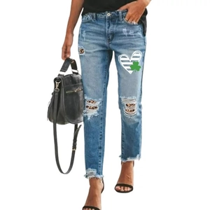 Women's ripped straight leg jeans with leopard print patches and shamrock heart print