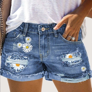 Short en jean taille mi-haute avec imprimé marguerites et détails déchirés
