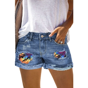 Pantaloncini di jeans blu da donna con toppe tie-dye colorate effetto strappato e baffi