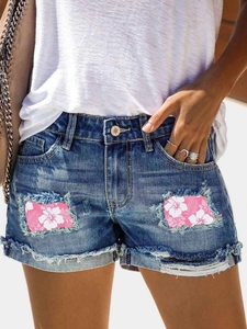 Short en jean taille haute pour femme avec patchs floraux tropicaux et détails déchiquetés
