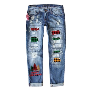 Light blue ripped jeans with plaid patches and Merry Christmas tree festive print