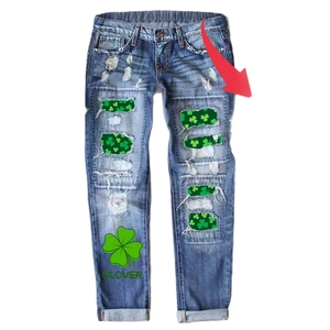 Women St. Patrick's Day ripped jeans with green clover print and embroidery details