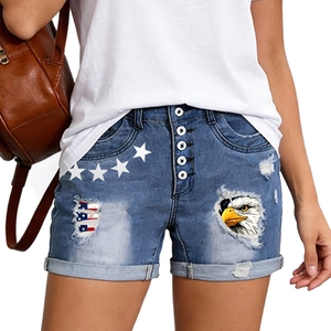Slim fit denim shorts with eagle print, star patches and ripped American flag details