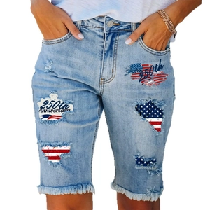 Light blue ripped denim shorts with US flag print and 250th Anniversary text for women