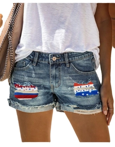 Women's denim shorts with American flag star print patches and distressed ripped details