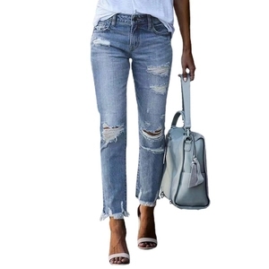 Women's light blue distressed straight-leg jeans with ripped details and frayed hems