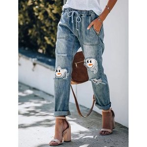 Women's light blue snowman print ripped denim joggers with drawstring waist and loose fit