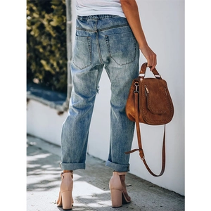 Rear view of light blue straight-leg jeans with washed effect and elastic waist