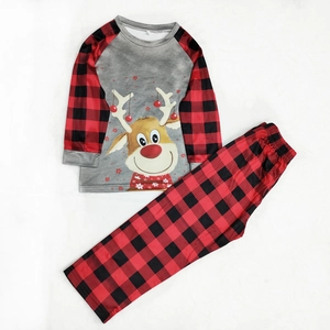 Kids Christmas pajama set with reindeer print and red buffalo plaid raglan sleeves