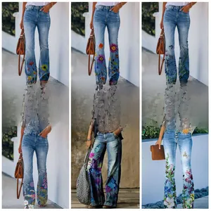 Various high-waisted flared jeans with colorful floral and butterfly prints