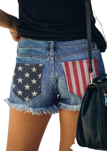 Women's denim shorts featuring American flag star and stripe pockets with raw fringe hem